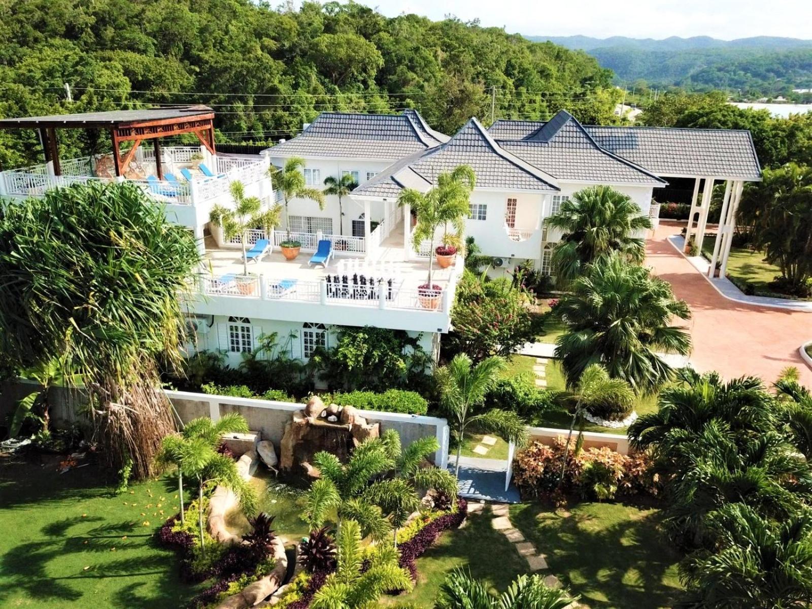 Mais Oui Villa Дискавери-Бэй Экстерьер фото